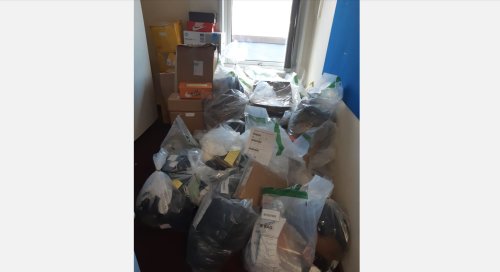 Two Luton men arrested after more than 300 items of designer clothing seized