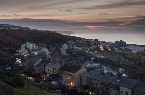 A dozen properties have been evacuated over safety concerns following rain
