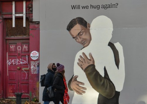 Liverpool Psychologist says hugging signals 'return to normality'