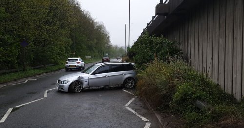 BMW spins out of control and crashes at A38 junction