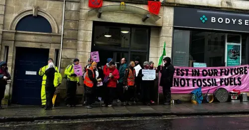 Live: Extinction Rebellion and Just Stop Oil scale Bristol building amid early-morning protest