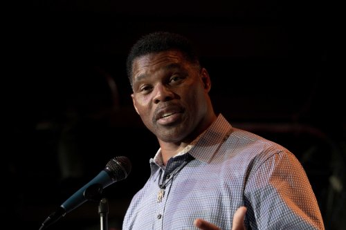 Herschel Walker threatens to sue over abortion accusation and is then attacked by son