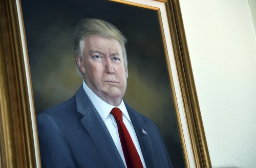 Trump calls on Polis to remove ‘purposefully distorted’ portrait of himself hanging in the Colorado capitol