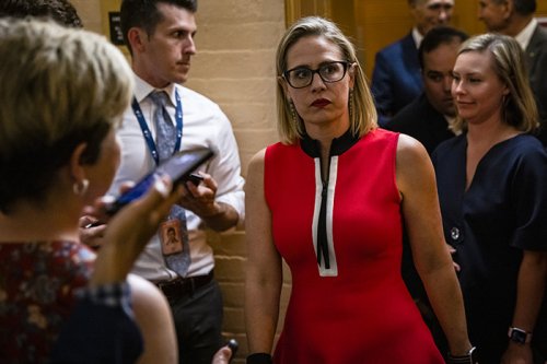 POLITICO Playbook: Sinema's vacation plans, Manchin gets booed and megadonor drama