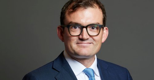 Tory MP charged over alleged sexual assaults at elite London club