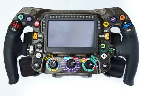 The steering wheel in an F1 race car requires fighter jet components and lots of practice