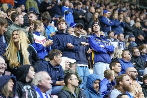 17 superb pictures of the 1,601 Portsmouth fans who celebrated 2-1 win over Wigan at the DW Stadium - gallery