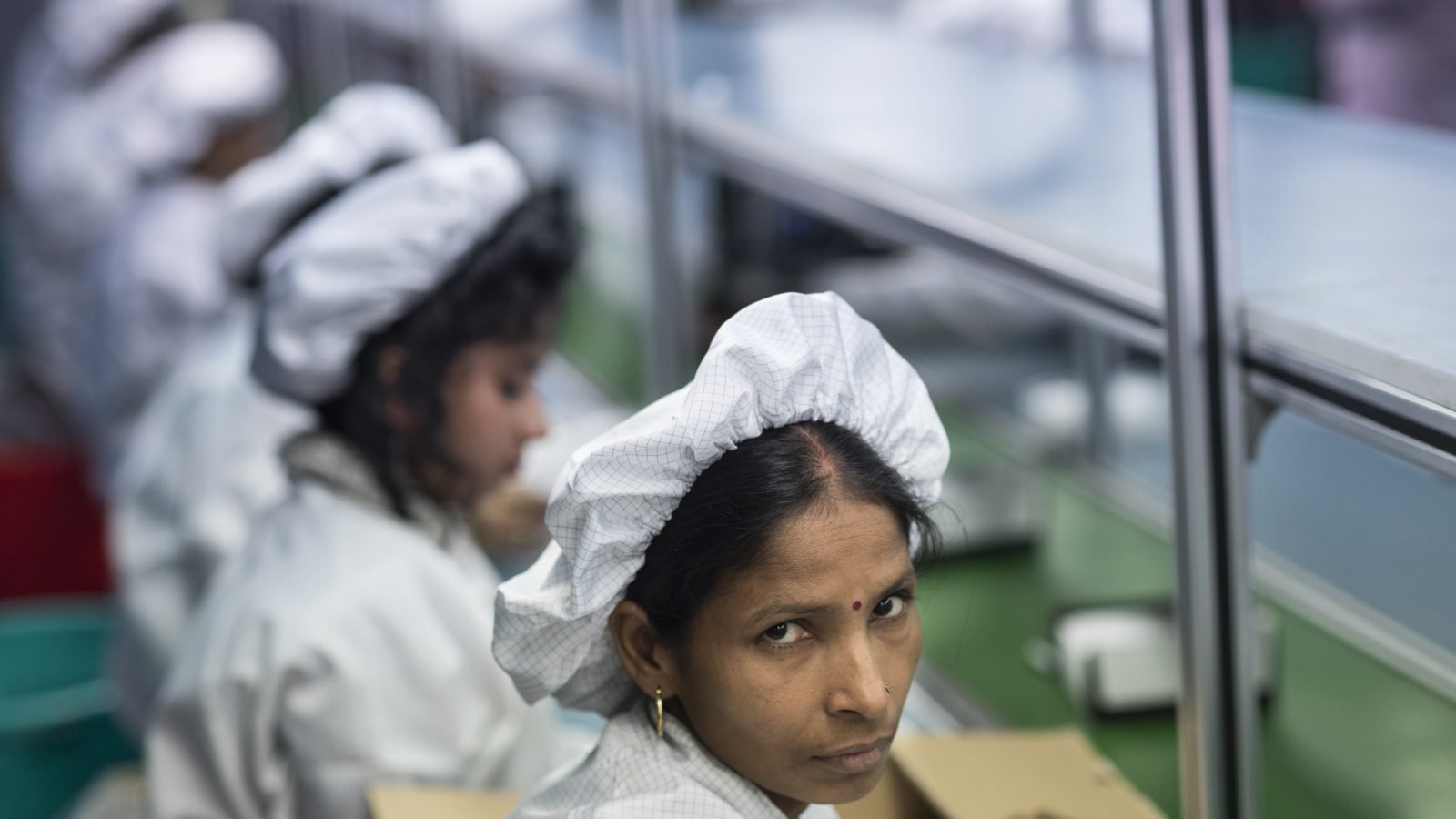 Apple and Foxconn lobbied India to relax its labor laws. Unions are fighting back
