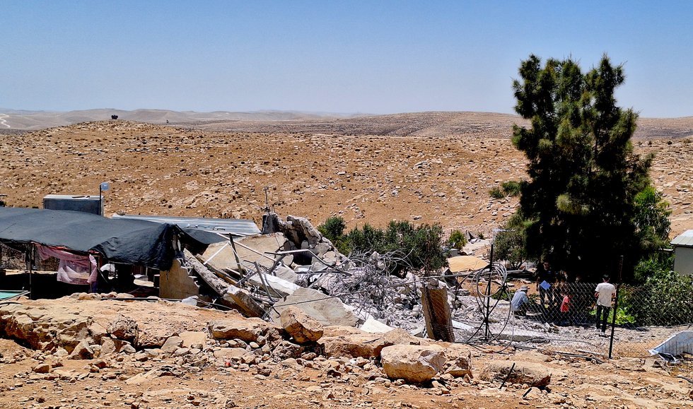 While Israel Bombards Gaza, Settlers are Stealing Palestinian Land in the West Bank