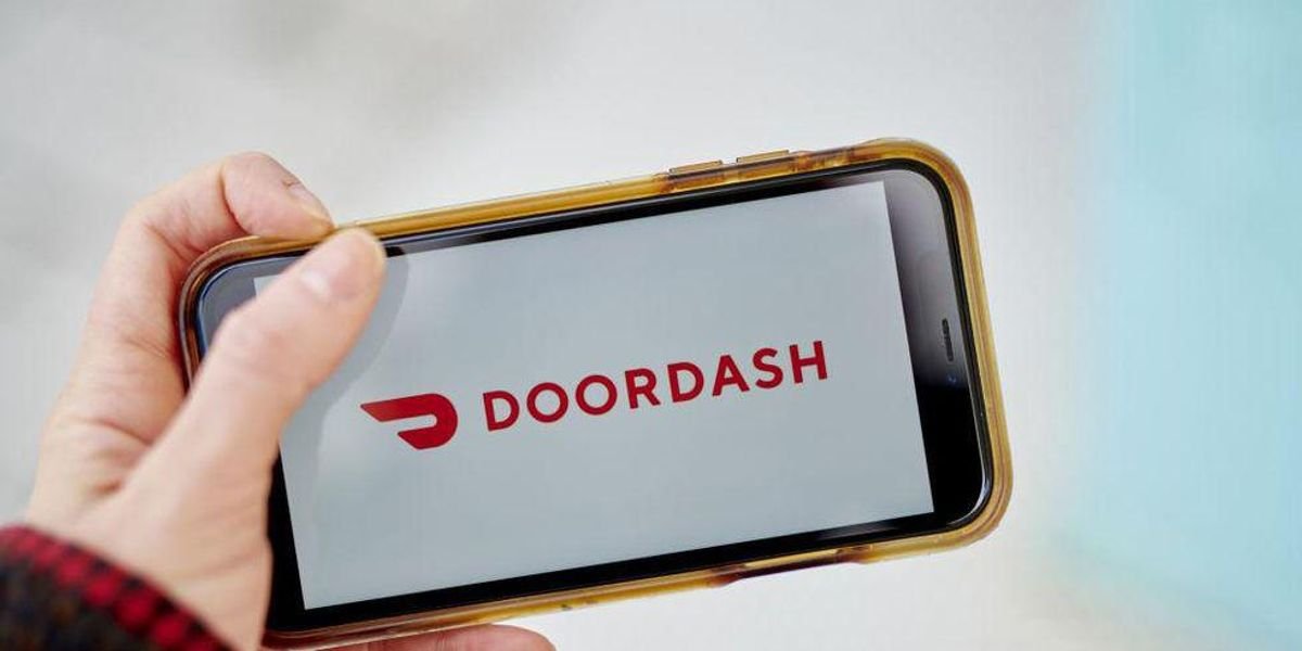 Uber and Lyft added surcharges to offset soaring gas prices. DoorDash won't pass the bill off to users.
