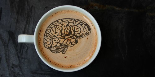 A low-dose of caffeine suppresses alpha brain waves and improves executive functioning