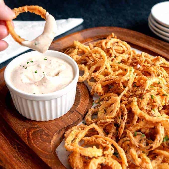 Crispy Cajun Onion Strings with Spicy Dipping Sauce