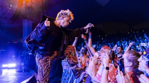 Machine Gun Kelly launches punch at fan after crowd storm stage at Louder Than Life gig