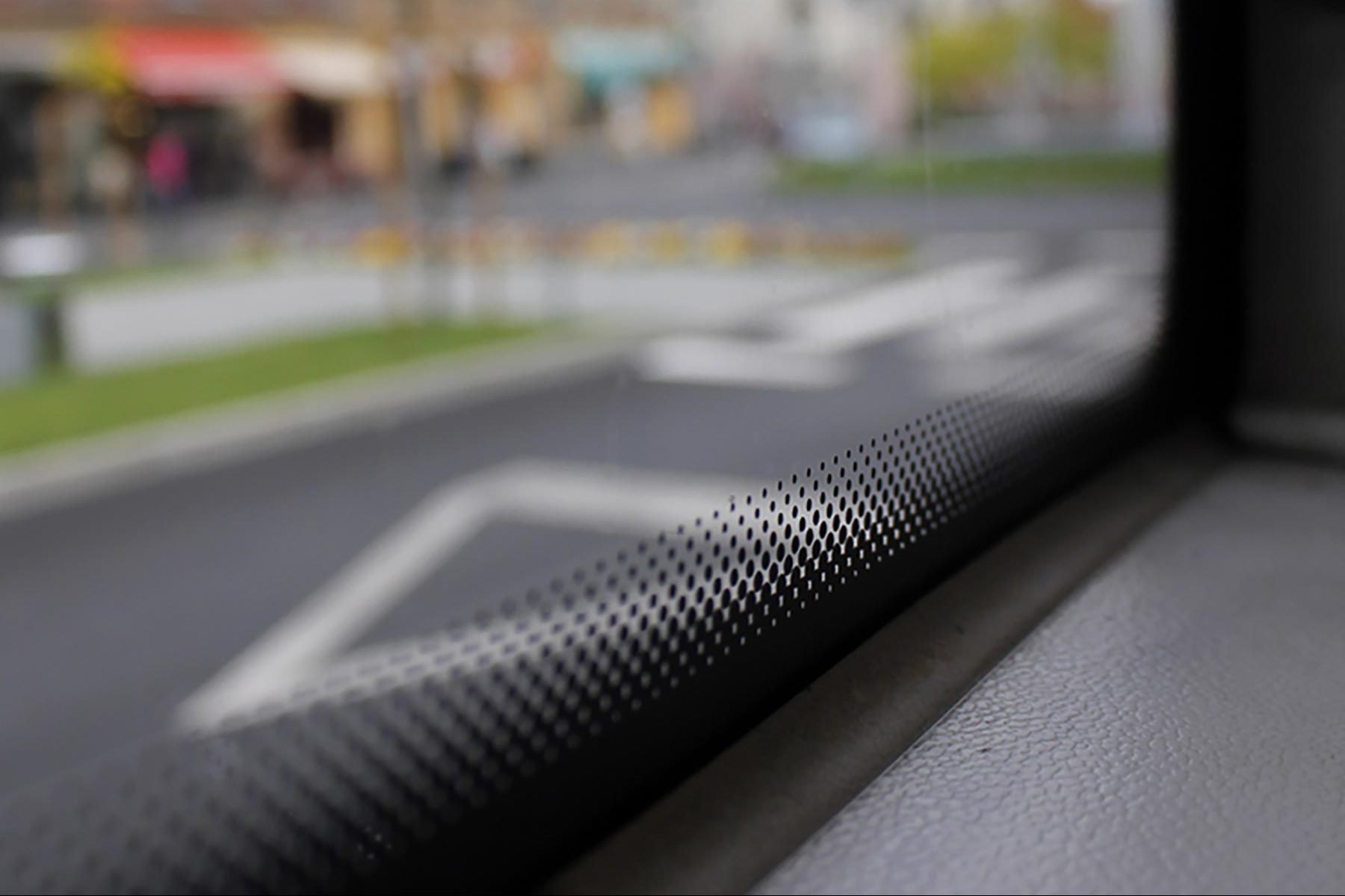 Here's Why Car Windows Have Those Little Black Dots