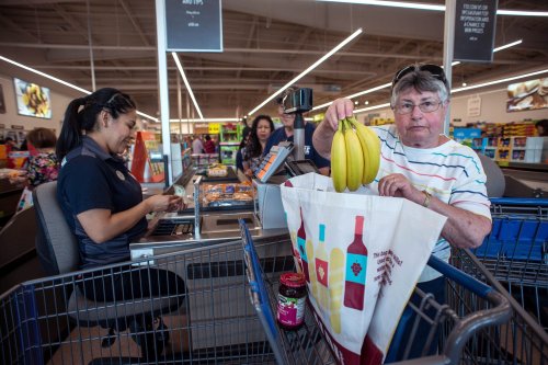 Here’s Why Aldi’s Cashiers Stay Seated Behind the Cash Register