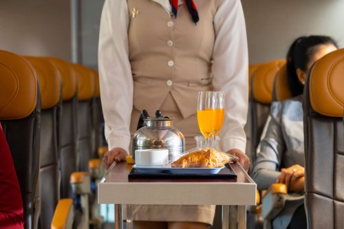 8 Freebies You Didn't Know You Could Get When Flying Economy, According to a Flight Attendant