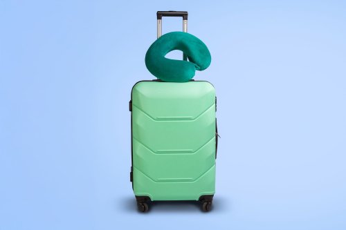 How to Actually Sleep on a Plane—and Wake Up Rested—According to Travel Pros