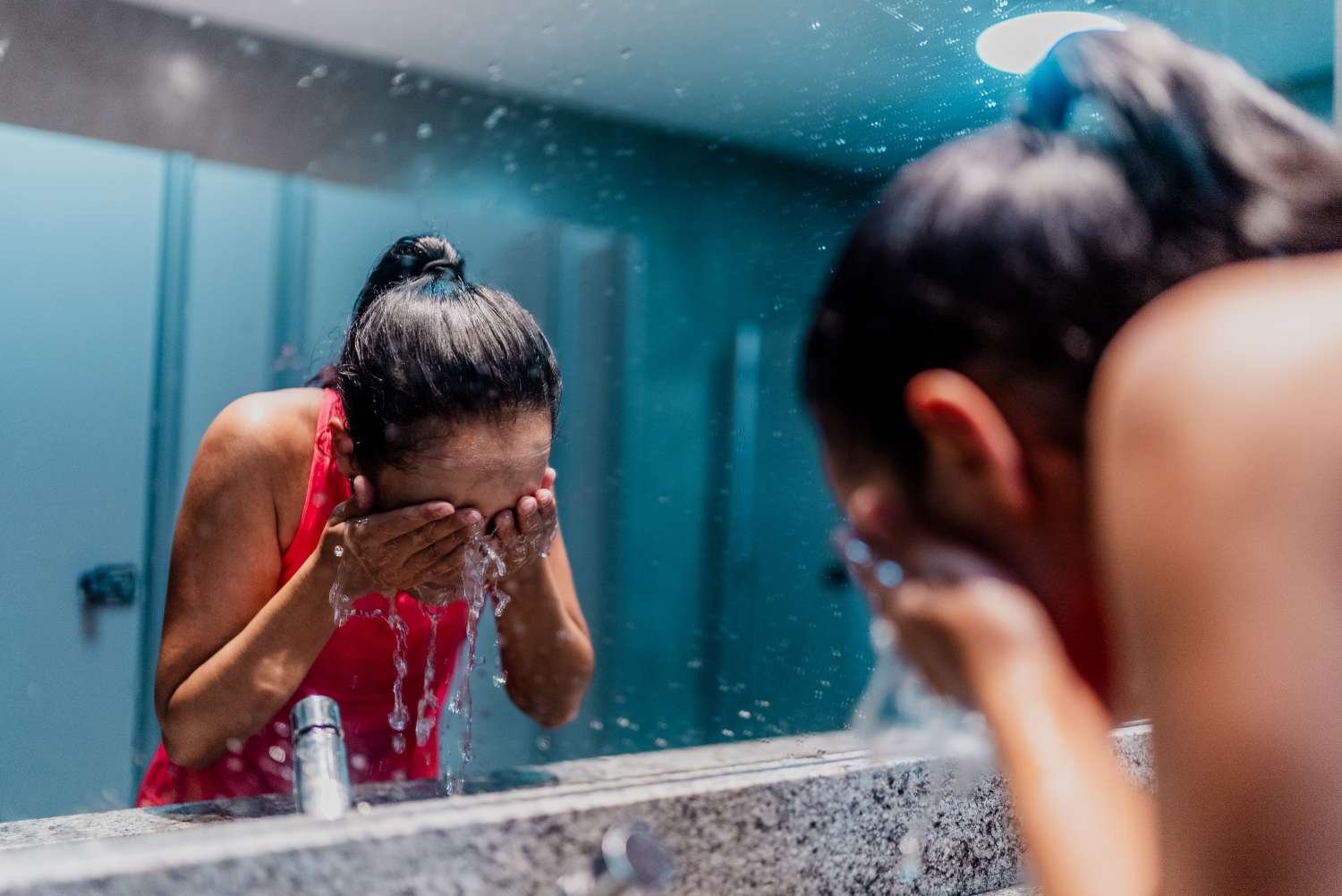 Should You Wash Your Face Before or After Working Out? Dermatologists Settle the Debate