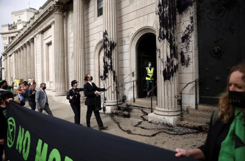 Climate activists spray black dye at Bank of England in 'Money Rebellion'