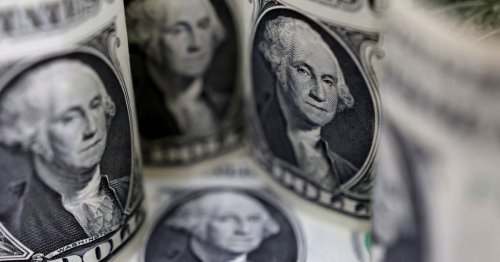 Dollar loiters off highs as traders wait on inflation data