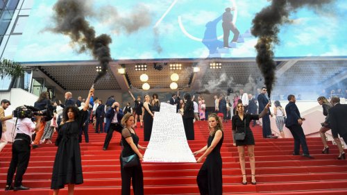 Activists use Cannes red carpet to draw attention to femicide victims in France