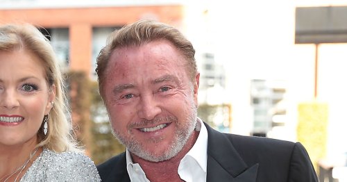 Michael Flatley snapped with stunning wife and young son in rare ...