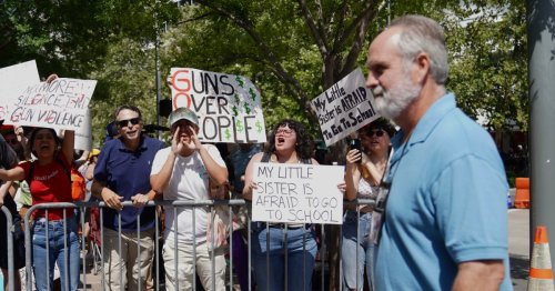 Protesters' anguished shouts fail to dampen gun enthusiasm at NRA convention in Houston
