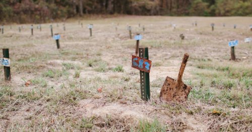 Coroner's office that buried men without telling families releases a policy that leaves questions unanswered