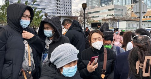 China says respiratory illness cases are under control as Taiwan issues travel advisory