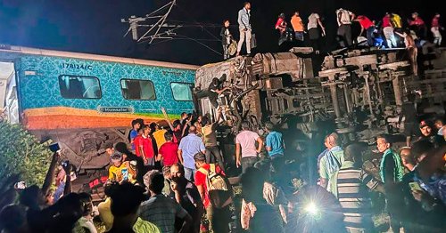 More than 200 dead and hundreds injured after passenger trains derail in India, officials say