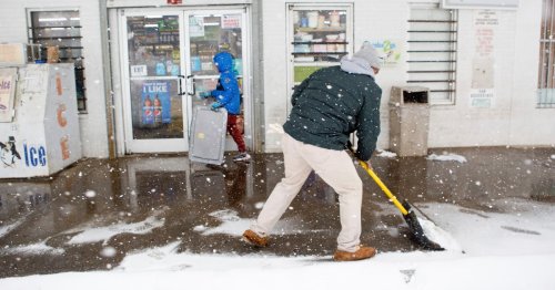 Powerful winter storm slams East Coast, leaving about 200,000 without power as thousands of flights canceled