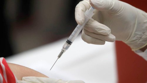 Flu vaccine no longer required for health workers in California county after outcry