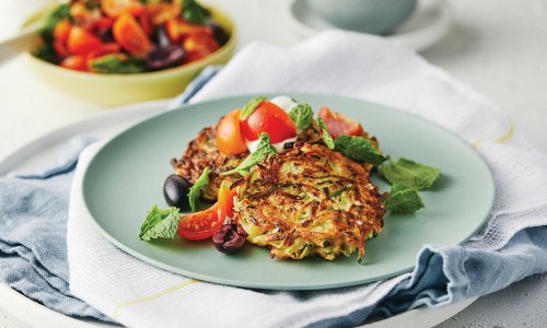 Recipe: Zucchini & halloumi fritters with tomato salad and herb yoghurt