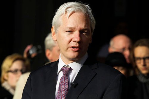 Julian Assange denies Russian hacking allegations, claims President Obama is trying to "delegitimize" Donald Trump