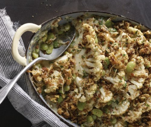 This cheesy and creamy cauliflower and lima bean gratin features vegetables baked to perfection