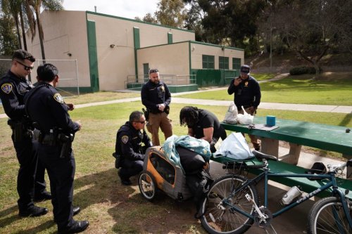 A man living in a riverbed was angry at San Diego police. Then he asked them for help.