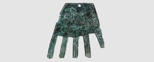 Bizarre 2,000-Year-Old Bronze Hand Found Covered in Mysterious Writing