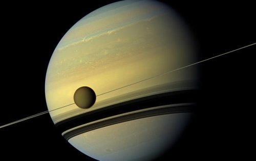 The Mystery of Titan’s Expanding Orbit