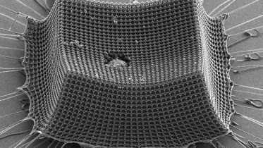 Tougher Than Kevlar and Steel: Ultralight Material Withstands Supersonic Microparticle Impacts