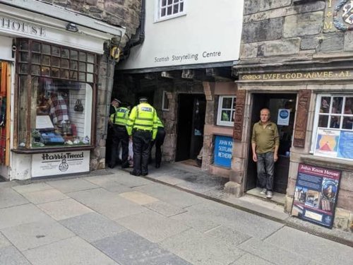 Two charged over alleged assault on man who shouted at Prince Andrew on Royal Mile