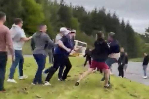 Pictures show Rangers and Hearts fans in mass brawl following Scottish Cup Final
