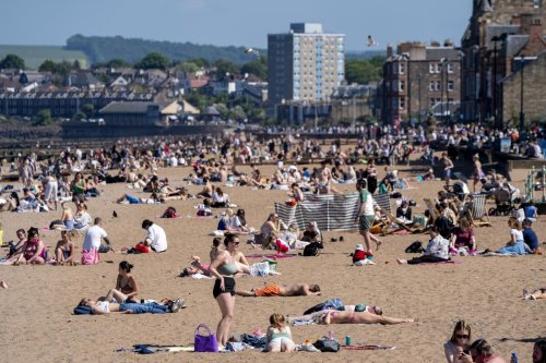 In pictures: Edinburgh locals flock to Portobello Beach to soak up the sunshine on hottest day of the year