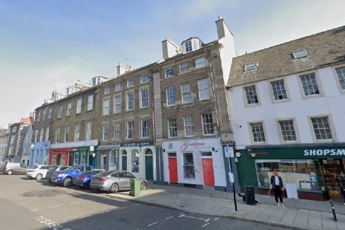 East Lothian high street roof terrace owners claims neighbours throw things at them