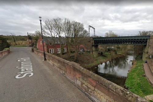 Man, 46, rushed to hospital after car crashed through bridge into river