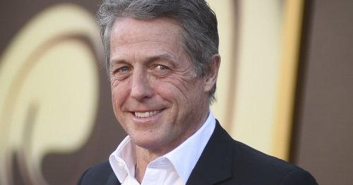 Hugh Grant says he got ‘enormous sum’ to settle suit alleging illegal snooping by The Sun tabloid