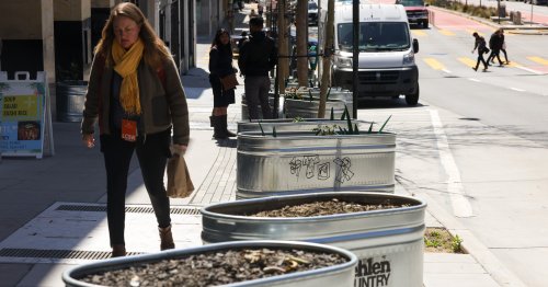 ‘Hostile architecture’ or just planters? Owners are cited by city after activist pressure
