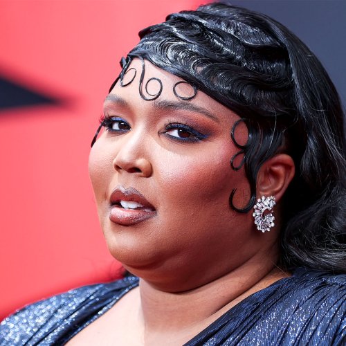 Lizzo Fans React To Her Showing Off 60-Lb Weight Loss In A 'Scorching Hot' Red Bodysuit In Her Latest Post: 'I Love This Era'
