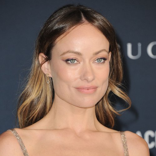 Olivia Wilde Breaks A Sweat In A Black Sports Bra, Crop Top, And Figure ...