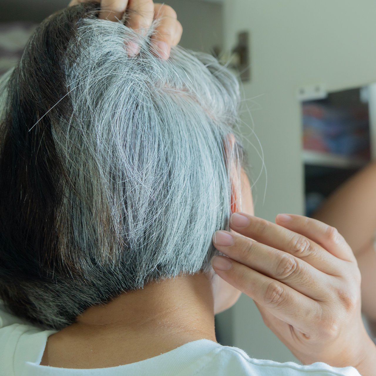 The Most Flattering Haircuts For Women Transitioning To Gray Hair, According To Experts
