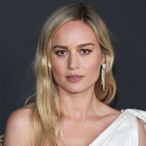 Brie Larson Shows Offer Her Incredible Physique In A Tie-Strap Floral Mini Dress For Date Night—How Is She Real?!